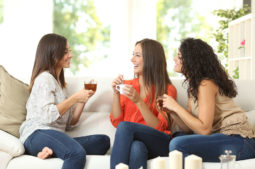 Three Girlfriends Talk and Laugh