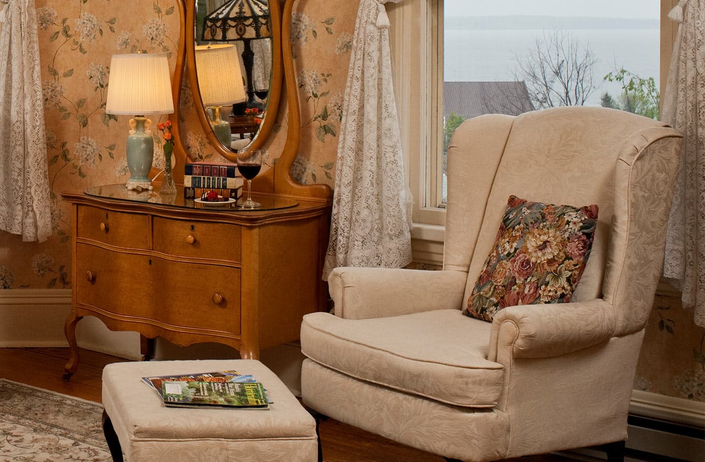 Chair with footstool and dresser in Room II