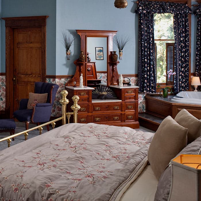 Bed and dresser in Room VII