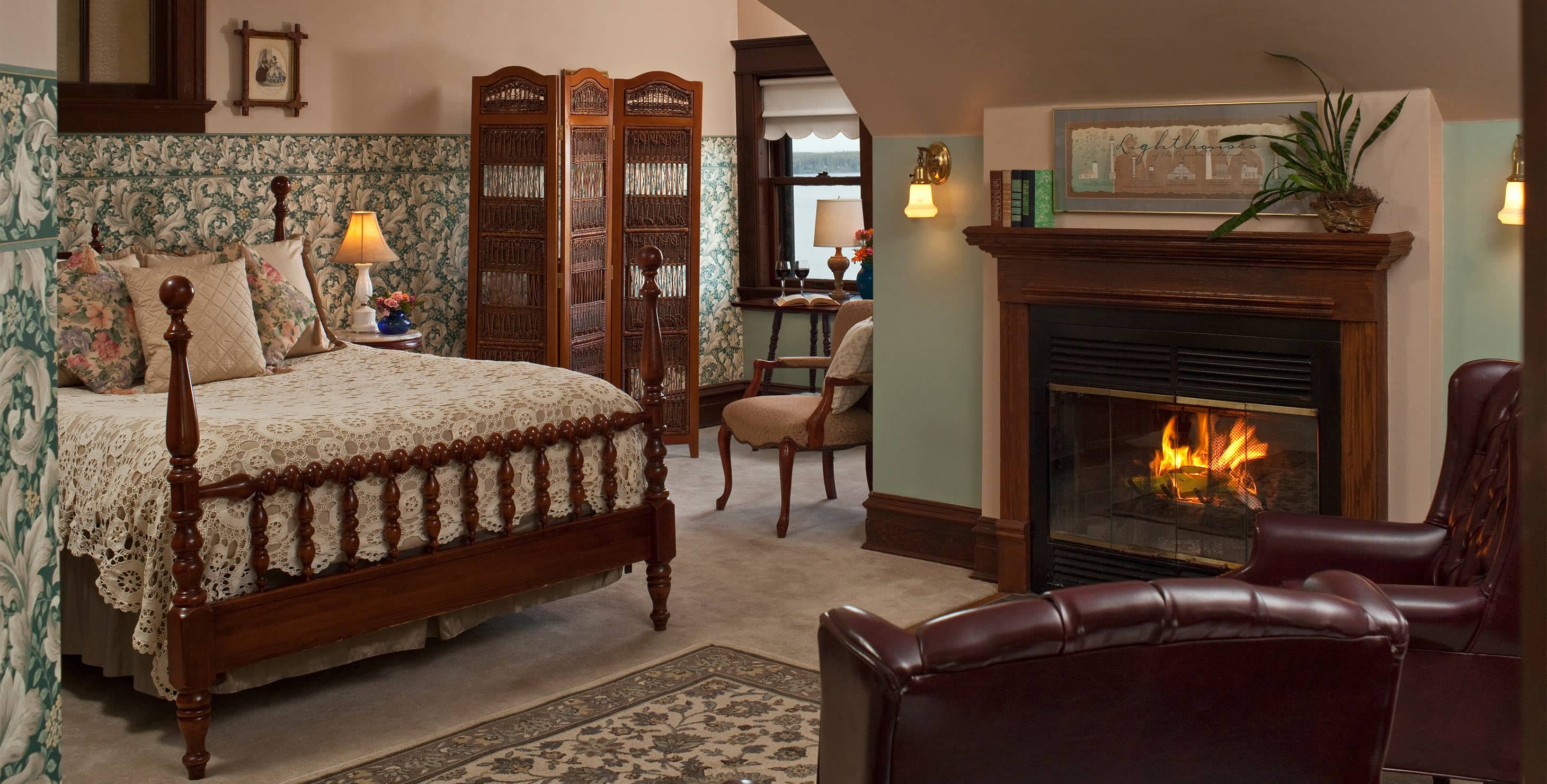 Bed, Fireplace, and Chairs in South room