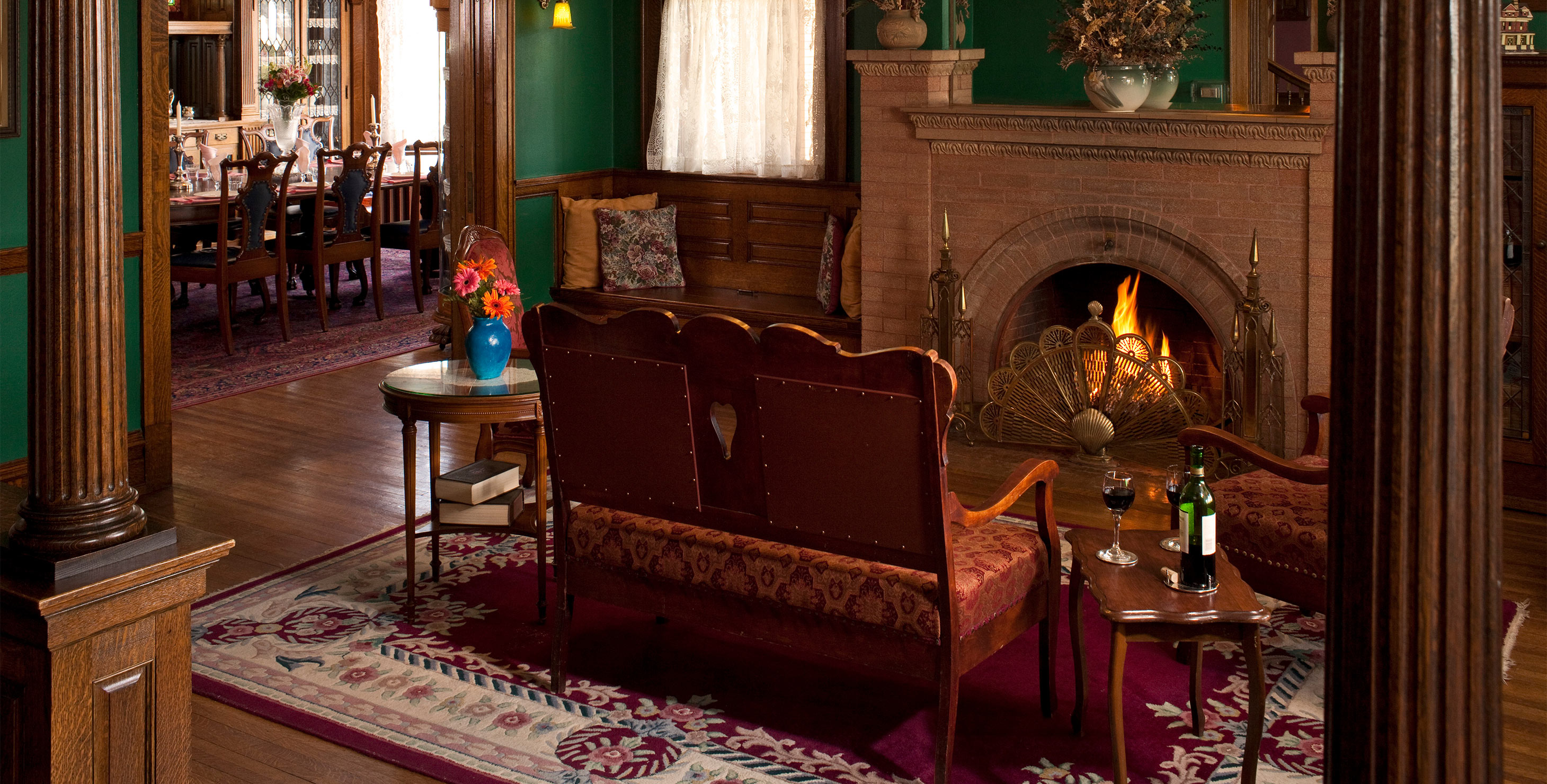 Living Room with fireplace at Chateau, dining room in background