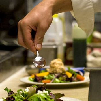 Chef preparing food in kitchen