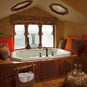 Elevated spa tub in Moroccan Suite