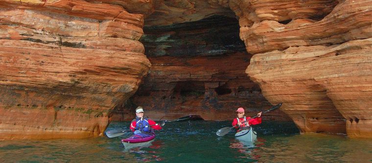 Two kayaks under the Sea Caves