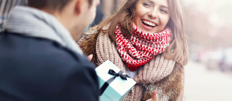 A joyous young woman with a big smile hopes to learn she was gifted a Lake Superior vacation.