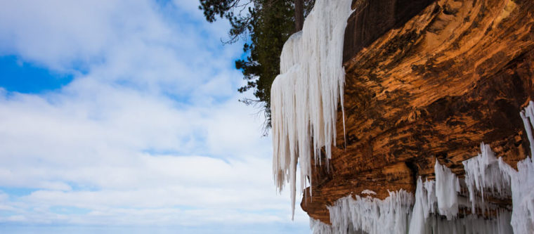 Photo outside the ice caves on Madeline Island: one of the best winter activities in Wisconsin.