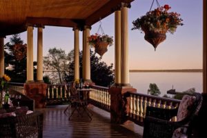 Photo of the porch of Old Rittenhouse Inn during sunset