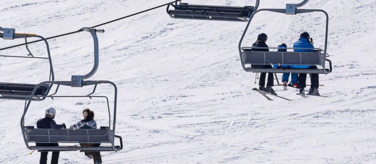 Group on ski lifts while skiing in Wisconsin near Bayfield