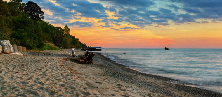 View of Lake Superior beach at sunset