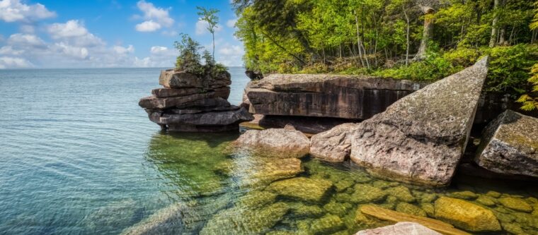 View of Lake Superior with rocks, one of the top things to do in Northern Wisconsin