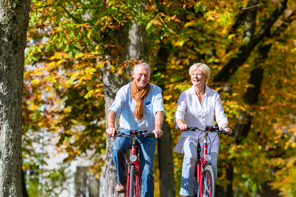 Older couple on Wisconsin bike trails during fall
